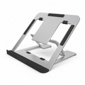 An adjustable compact laptop stand made of aluminum with black silicone pads, featuring multiple viewing angles.