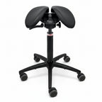 A black saddle chair designed for ergonomic sitting with adjustable height and width, active sitting mechanism, and a split saddle design to promote natural spinal curvature.